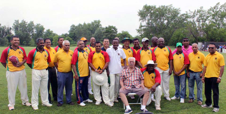 Honorary captain Gary Nascimento flanked by the Gary Nascimento Guyana XI team and officials. Photo by Warren Figueira
