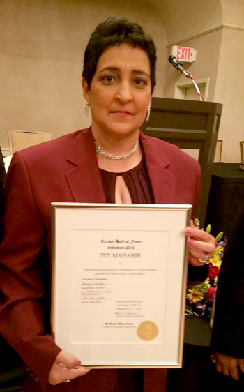 Inductee Ivy Mahabir poses with her Hall of Fame certificate.