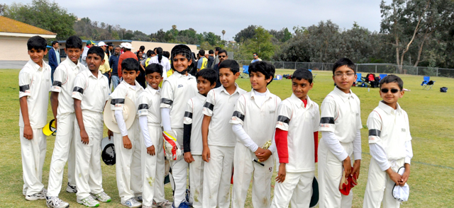 California Cricket Academy Boys with black ribbons showing respect for coach Owen Graham.