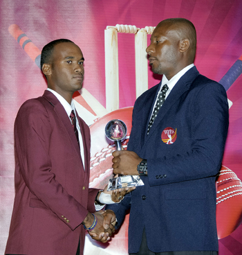 Kraigg Brathwaite collects his award from Nixon McLean. Photo by WICB Media/Randy Brooks of Brooks Latouche Photography