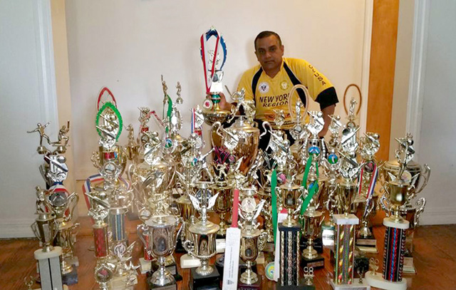 Debo Sankar with his collection of trophies.