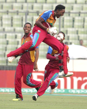 A jubilant Shamar Springer celebrates West Indies win over Bangladesh. Photos: ICC