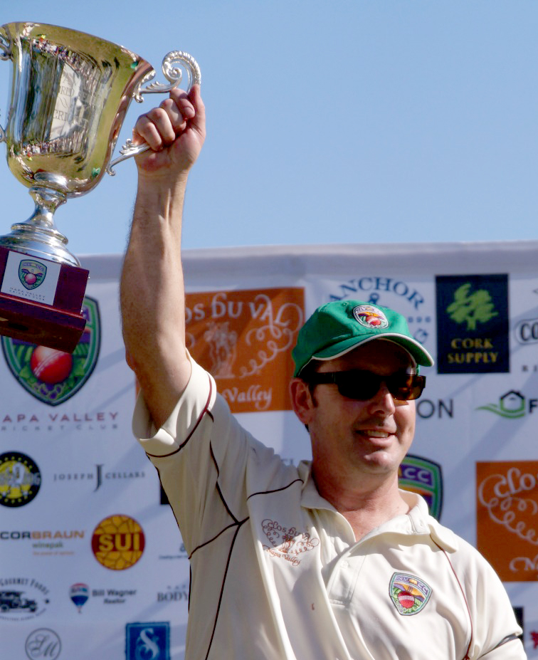 Australia America captain Rob Bolch holds aloft the Napa Valley World Series of Cricket trophy. Top photo, the 2015 Australia / America team. Photos by Jared Thatcher