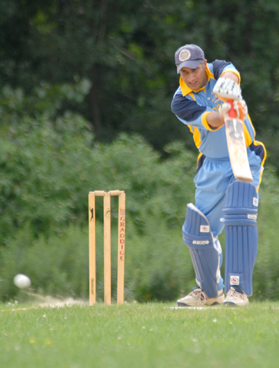 Amjad Khan continues his good form with the bat hitting 51. Photo by Shiek Mohamed