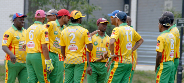 The Guyana team celebrates the fall of wicket during their clash with Bangladesh. Photos by Shiek Mohamed