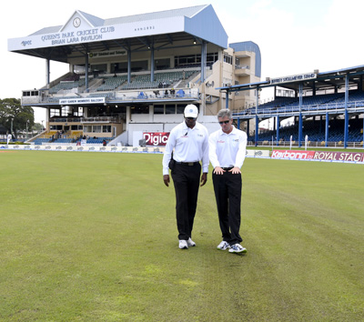 Umpires inspect the Queen's Park Oval in Port of Spain, Trinidad. Photo by WICB Media/Randy Brooks of Brooks Latouche Photography