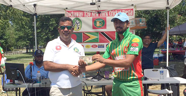Syed Hussain collects his man-of-the-match award from tournament sponsor Hafeez Ali. Photo by Javed Ali.