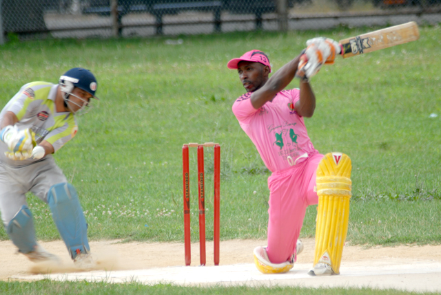 Clain Williams seen here in 2013 sporting a pink uniform representing Big Apple Cricket Club. Photo by Shiek Mohamed