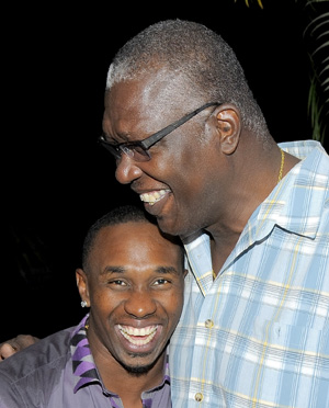 Dwayne Bravo (left) and West Indies manager Joel Garner. Photo by Randy Brooks/Brooks LaTouche