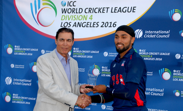 Jasdeep Singh (right) receives the man of the match award after picking up 3 for 29 and contributing a vital 37 not out to help USA win the final.