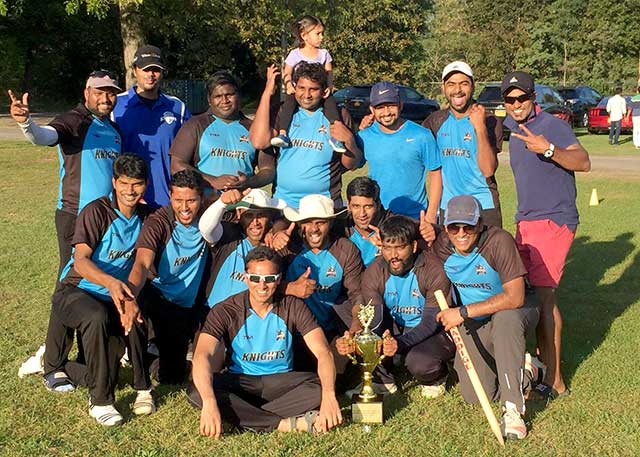 Knights poses with T20 championship.