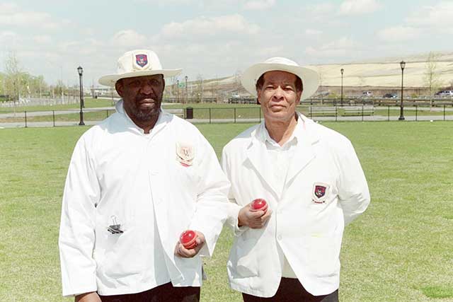 Umpires Carl Patrick and Victor Reeves